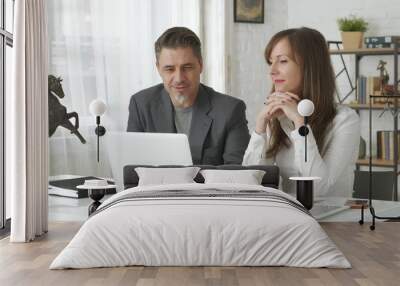 Business people working at desk Wall mural