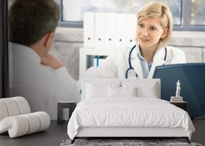 doctor taking notes about patient Wall mural