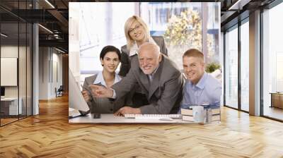 Portrait of businessteam at work Wall mural