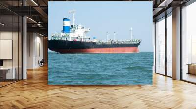 Logistics and transportation ,International Container Cargo ship in the sea, import export business ,Cargo ship at the port ,Freight Transportation, Shipping, Nautical Vessel . Wall mural