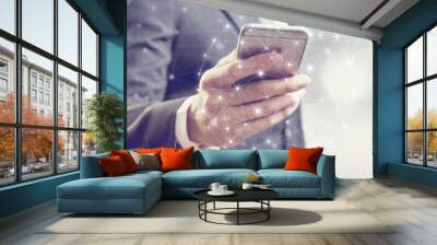 Businessman hand using mobile phone and dots internet online communication network Wall mural