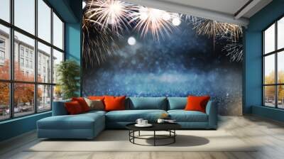 Gold and blue Fireworks and bokeh in New Year eve and copy space. Abstract background holiday. Wall mural