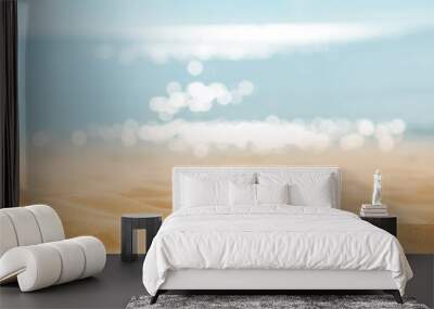 Summer tropical sand beach and bokeh sun light on sea background, copy space. Wall mural