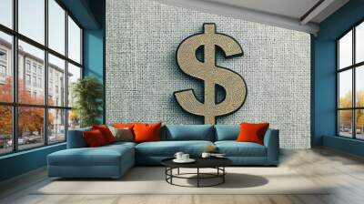 Close-up of a wooden dollar sign on textured fabric, symbolizing finance and investment concepts in a modern setting. Wall mural