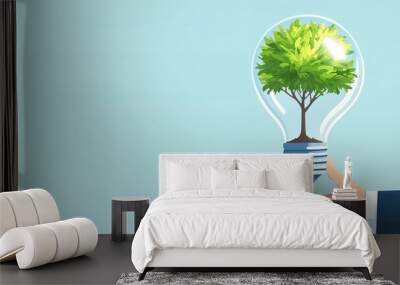 Hand holding a light bulb with a tree inside, symbolizing green energy. Wall mural