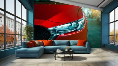 This Front car all new brand japan red color on room customer backbround parked in showroom of thailand for transport Illustrative editorial image. Wall mural