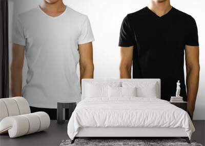 A man in an empty clean white and black t-shirt. Front view. Isolated on white background Wall mural