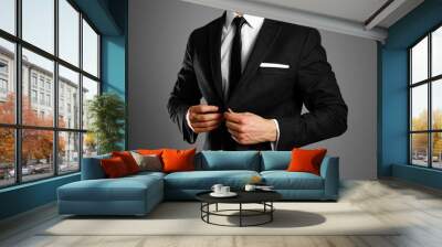 Businessman in a black suit, white shirt and tie. Studio shooting Wall mural