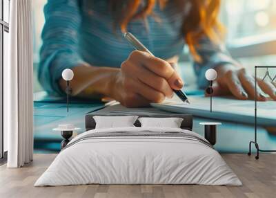 Close-up of business woman working with financial documents in office. Wall mural