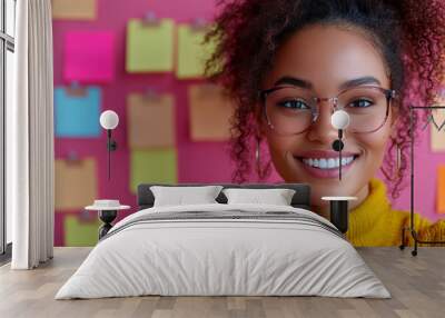 A cheerful office worker with sticky notes and a pen against a vibrant pink background, showcasing their creativity, Wall mural