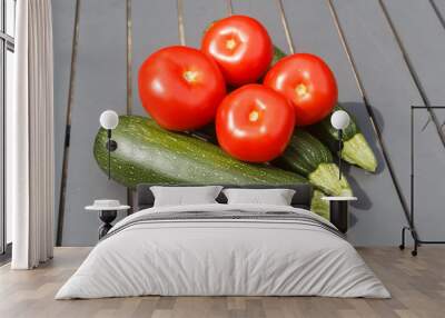 Summer vegetables, whole tomatoes and zucchinis Wall mural