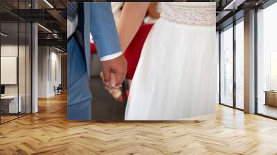 hands wedding couple bride and groom together during marriage celebration Wall mural