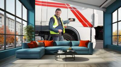 happy trucks driver in front of container delivery truck Wall mural