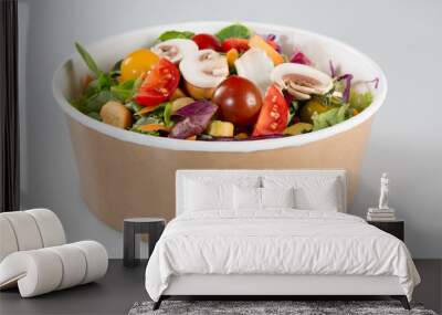 traditional salad in a carton container isolated on a white background Wall mural