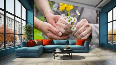 Elderly care - hands, bouquet Wall mural