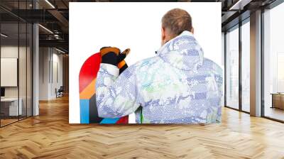 Senior man with snowboard - back view Wall mural