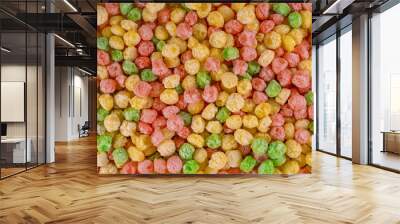 Cereal colored balls. Breakfast food. flat lay, top view. Delicious and nutritious fruit cereal loops flavorful, healthy and funny addition to kids breakfast Wall mural