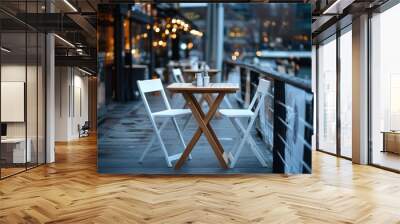 A picturesque riverside cafe features empty tables and chairs awaiting visitors, adorned with soft evening lighting creating a warm and inviting ambiance. Wall mural