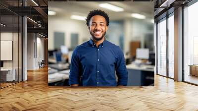 Portrait of smiling young businessman at the office Wall mural