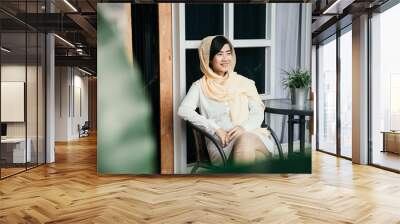 casual young muslim woman with hijab portrait Wall mural