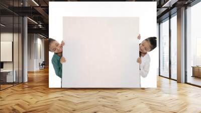 happy two young girl holding empty white board isolated in white background Wall mural