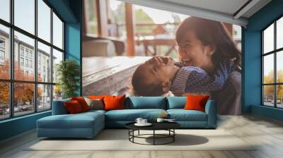 mother and child girl playing Wall mural