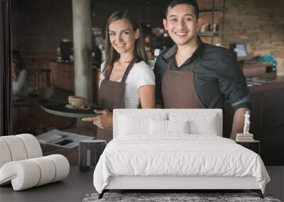 two waitress smiling to camera in the cafe Wall mural