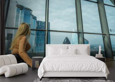  A woman enjoining the city view  at The Sky Garden  at 20 Fenchurch Street is a unique public space designed by Rafael Vinoly Architects. Wall mural