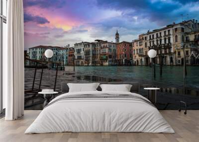 Panoramic view on famous Grand Canal among historic houses in Venice, Italy after rain at sunset. Wall mural