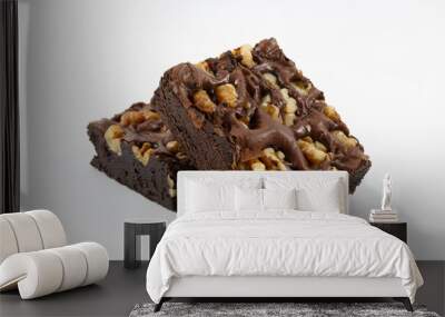 Delicious chocolate walnut brownies on white background Wall mural