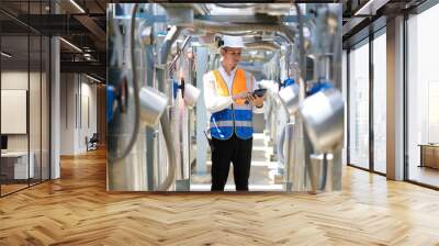 Engineer or technician checking air conditioner control valve at plumbing systems Wall mural