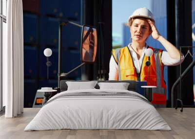 factory workers or engineer feeling tired for working in containers warehouse storage Wall mural