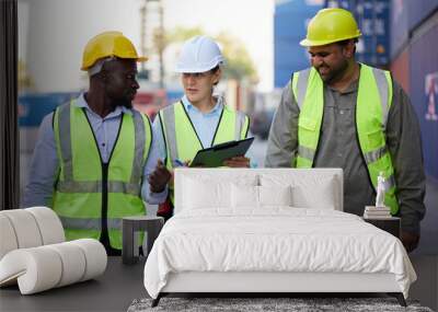 workers walking and talking about work or project in containers warehouse storage Wall mural