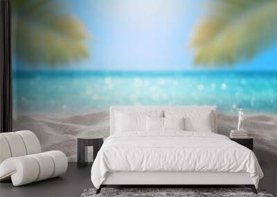 beautiful sandy beach with tropical palm leaf on blur ocean background summer concept Wall mural