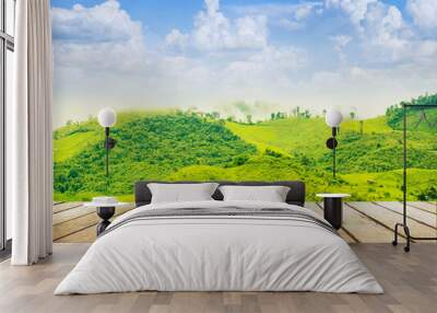 wooden table top with the mountain landscape Wall mural