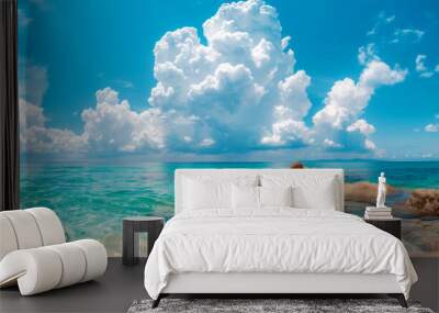 A panoramic view of a turquoise sea with a clear blue sky and fluffy white clouds, summer wallpaper Wall mural