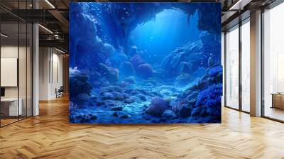 An underwater scene with coral reefs and mysterious cave walls with a blue color scheme Wall mural