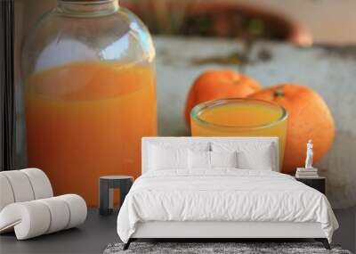 bottle of orange juice Wall mural