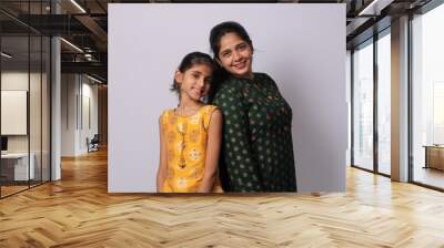 Indian mother daughter on white background. mothers day Wall mural