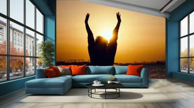 Young Woman Silhouette in Sunset Wall mural