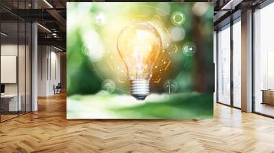 Innovation technology eco green concept.  Icon bulb energy sources for renewable on green blur background . Concept with innovation inspiration. new ideas to innovative from the internet big data. Wall mural