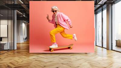 Cheerful fashionable cool stylish extravagant mature young grandma on skateboard on color background created with Generative AI technology Wall mural