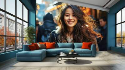 Portrait of beautiful cheerful stylish smiling casual gorgeous asian young woman with curly hair outdoors Wall mural