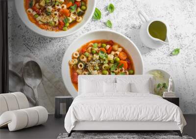 Vegetarian minestrone - delicious healthy mediterranean lunch. On a light table, flat lay Wall mural