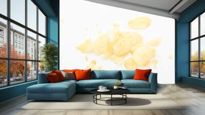 Crispy potato chips and crumbs, on white background. Wall mural