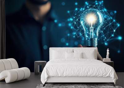 Businessman holding light bulb connected with network concept for idea innovation and inspiration Wall mural