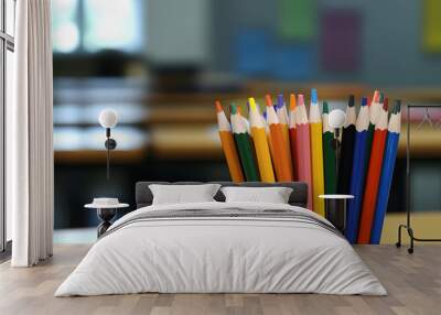 A close-up image of vibrant, sharpened color pencils. School theme Wall mural