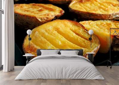 Baked potato halves. Ruddy baked potatoes in the peel. Wall mural