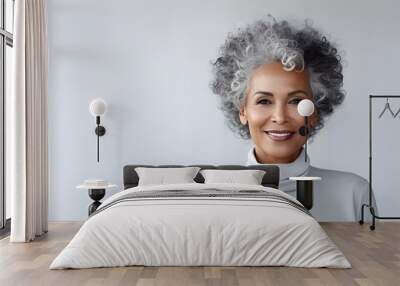 Beautiful african american senior woman portrait isolated on light grey background Wall mural