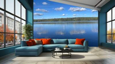 beautiful blue lake view, blue sky with white clouds reflections on the lake surface Wall mural